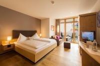 Posteľ alebo postele v izbe v ubytovaní Aktiv Hotel Schweizerhof Kitzbühel