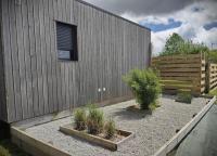 Vonkajšia záhrada v ubytovaní Cottage chaleureux avec Sauna & Jacuzzi