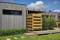 Vonkajšia záhrada v ubytovaní Cottage chaleureux avec Sauna & Jacuzzi