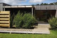 Vonkajšia záhrada v ubytovaní Cottage chaleureux avec Sauna & Jacuzzi