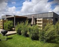 Vonkajšia záhrada v ubytovaní Cottage chaleureux avec Sauna & Jacuzzi