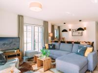 A television and/or entertainment centre at Tauern Lodge L