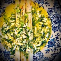 two slices of food with broccoli on a plate at Li Ter Hôtel in Marche-en-Famenne
