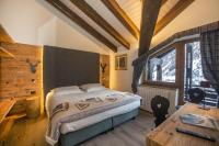 Posteľ alebo postele v izbe v ubytovaní Hotel Pilier D'Angle & Wellness
