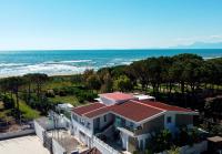 an aerial view of a house and the ocean at Aquamaris Design Suite &amp; Spa in Paestum