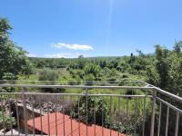 a view from the balcony of a house at Apartment Danica in Malinska