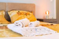 A bed or beds in a room at LOVELY AND SUNNY APARTAMENT 300m FROM BEACH!!