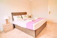 A bed or beds in a room at LOVELY AND SUNNY APARTAMENT 300m FROM BEACH!!