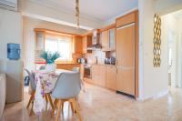 A kitchen or kitchenette at LOVELY AND SUNNY APARTAMENT 300m FROM BEACH!!