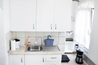 Kuchyňa alebo kuchynka v ubytovaní Rent House Daphne