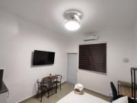 TV a/nebo společenská místnost v ubytování La casita de Gazcue