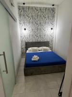 Łóżko lub łóżka w pokoju w obiekcie B&B Regina Rooms