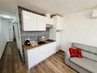 Kuchyň nebo kuchyňský kout v ubytování Calpe apartamento con vistas al mar impresionantes a 5 min de la playa aire wifi parking comunitario