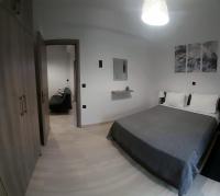 Posteľ alebo postele v izbe v ubytovaní Eva apartment