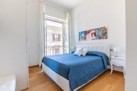 A bed or beds in a room at Elena House Apartments