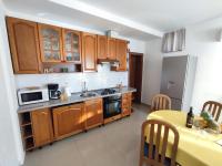 Kuchyň nebo kuchyňský kout v ubytování Villa Orada
