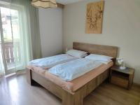Posteľ alebo postele v izbe v ubytovaní Garni Hattlerhof B&B