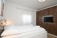 Posteľ alebo postele v izbe v ubytovaní Holiday Home Luka Pridraga