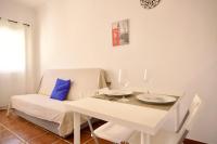 Posedenie v ubytovaní Apartamento cerca de la playa Torrecilla
