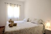 Posteľ alebo postele v izbe v ubytovaní Apartamento cerca de la playa Torrecilla