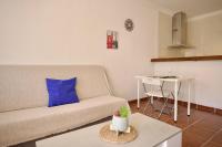 Posedenie v ubytovaní Apartamento cerca de la playa Torrecilla