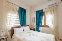 Posteľ alebo postele v izbe v ubytovaní Villa Chara