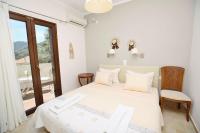 Posteľ alebo postele v izbe v ubytovaní Kores Villas
