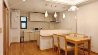A kitchen or kitchenette at Belgravia Serviced Residence Wuxi