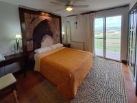 Posteľ alebo postele v izbe v ubytovaní Hotel Rural & Spa Las Nubes