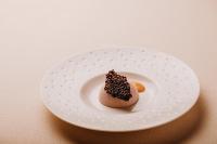 a dessert on a white plate on a table at Locanda Solagna in Quero