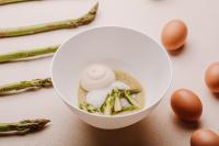 a bowl of food with vegetables and eggs on a table at Locanda Solagna in Quero