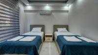Postel nebo postele na pokoji v ubytování Serenity Villa