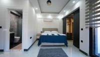Postel nebo postele na pokoji v ubytování Serenity Villa