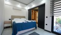 Postel nebo postele na pokoji v ubytování Serenity Villa