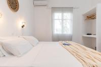 Posteľ alebo postele v izbe v ubytovaní Naxos Beachwalk Rooms