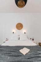 Posteľ alebo postele v izbe v ubytovaní Naxos Beachwalk Rooms