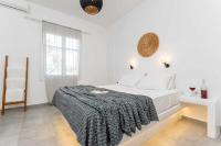 Posteľ alebo postele v izbe v ubytovaní Naxos Beachwalk Rooms