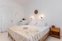 Posteľ alebo postele v izbe v ubytovaní Naxos Beachwalk Rooms