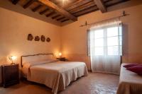 Posteľ alebo postele v izbe v ubytovaní Agriturismo Tenuta Roccaccia