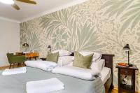 Posteľ alebo postele v izbe v ubytovaní P&O Podwale Apartments