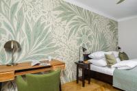 Posteľ alebo postele v izbe v ubytovaní P&O Podwale Apartments