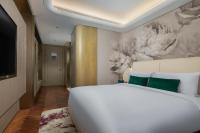 Blossom House Shanghai On The Bundにあるベッド
