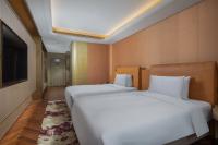Blossom House Shanghai On The Bundにあるベッド