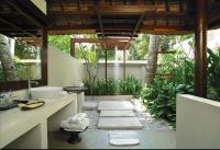 a bathroom with a sink and a mirror at Qunci Villas Resort in Senggigi