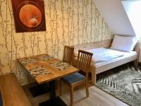 Łóżko lub łóżka w pokoju w obiekcie Golden Wood Apartments