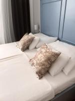 Postel nebo postele na pokoji v ubytování Centrum Luxury Rooms