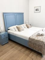 Postel nebo postele na pokoji v ubytování Centrum Luxury Rooms