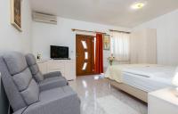 Postel nebo postele na pokoji v ubytování Studio Apartment Oliva