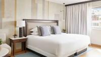 A bed or beds in a room at Hyatt Regency Hesperia Madrid