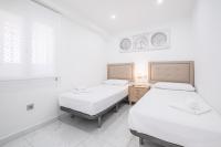 Postel nebo postele na pokoji v ubytování Veracruz 17-B Deluxe Apartament Levante Beach